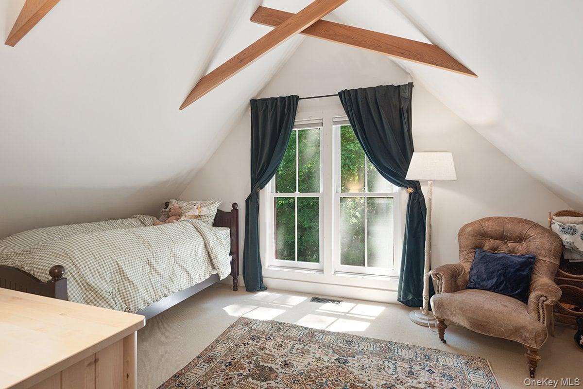 1821 Spring Valley Road Ossining, NY 10562 - Photo 36 of 48 Bedroom 3 on the second floor boasts wood vaulted ceilings, large windows, and two spacious closets.