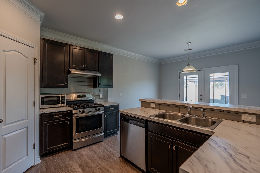 102 Talisker Way Greenville, SC 29607 - Photo 10 of 18 This modern kitchen features stylish finishes and abundant light, perfect for culinary endeavors.