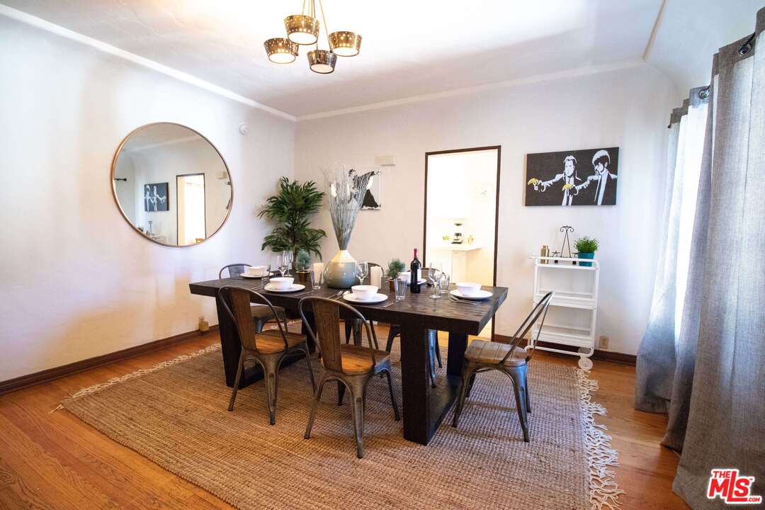 363 North Kings Road Los Angeles, CA 90048 - Photo 6 of 9 a view of a dining room with furniture and wooden floor