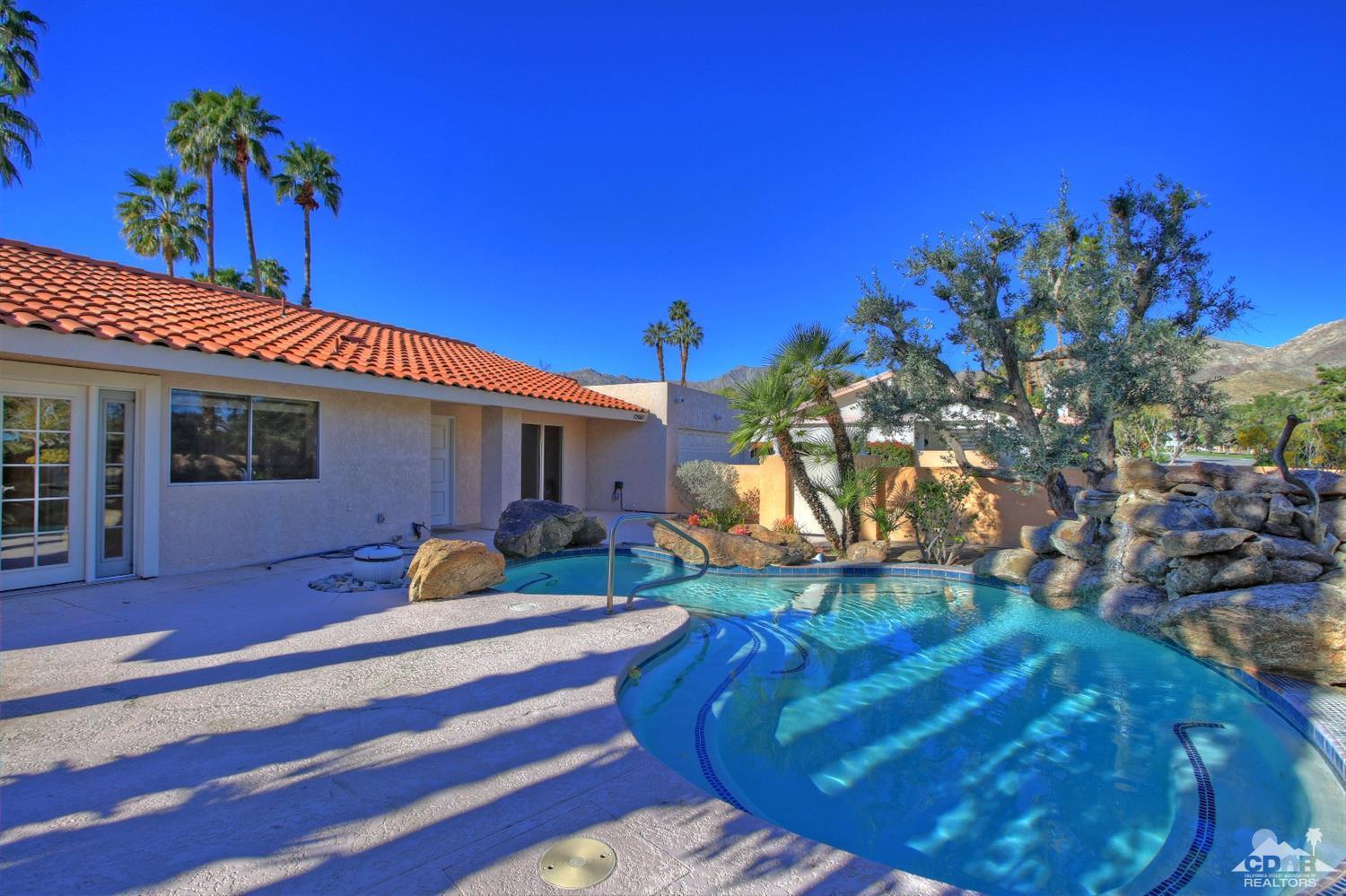 72957 Haystack Road Palm Desert, CA 92260 - Photo 1 of 38 a view of a house with swimming pool