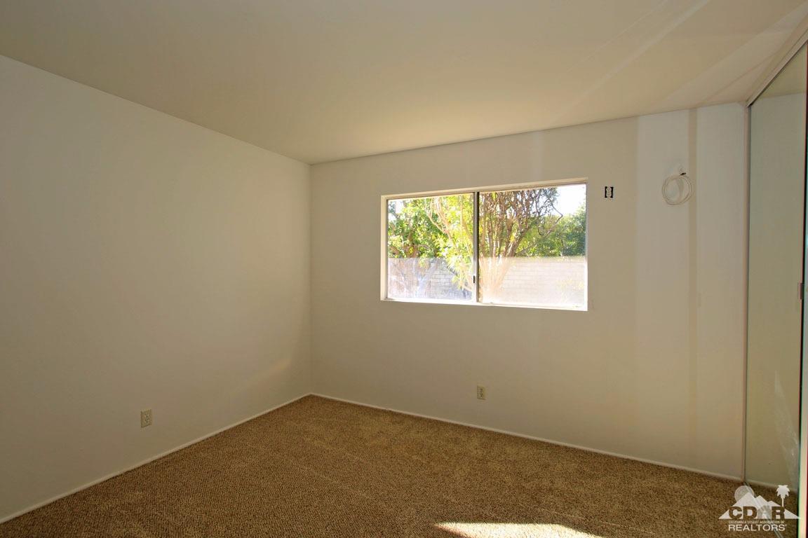 72957 Haystack Road Palm Desert, CA 92260 - Photo 38 of 38 an empty room with a window