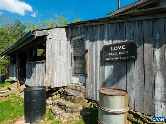 a room with furniture and a large window