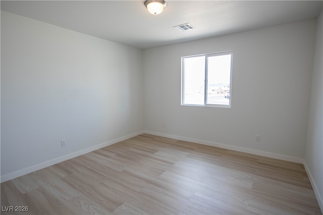 3871 North Mayfield Ranch Road Pahrump, NV 89060 - Photo 18 of 33 Guest Bedroom #1