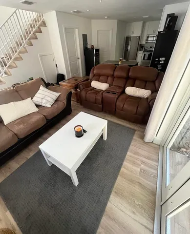 a living room with furniture and a couch