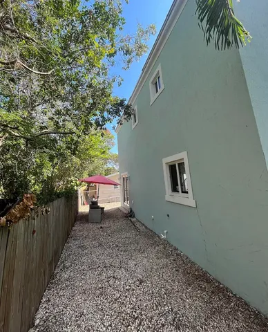 a house view with a backyard