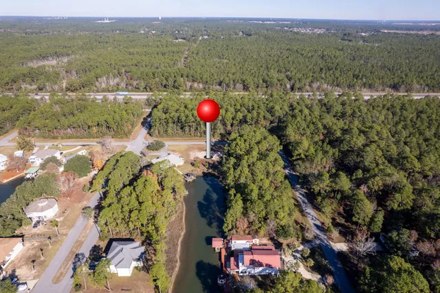 a view of a houses with a yard