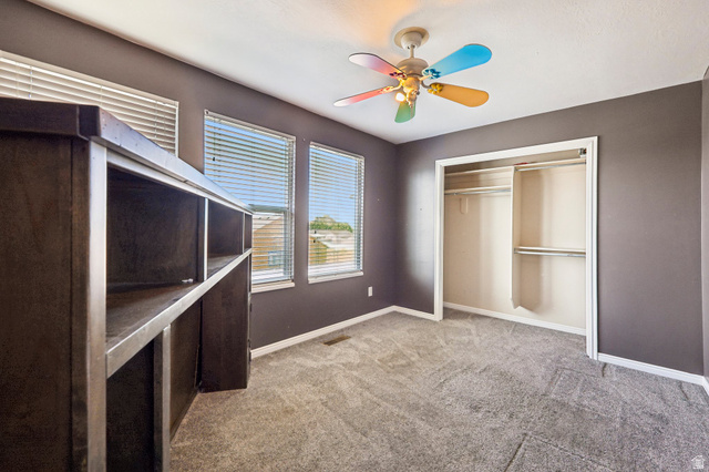 3215 West 450 North West Point, UT 84015 - Photo 21 of 40 Room featuring gray wall paint, carpeting, and white baseboards