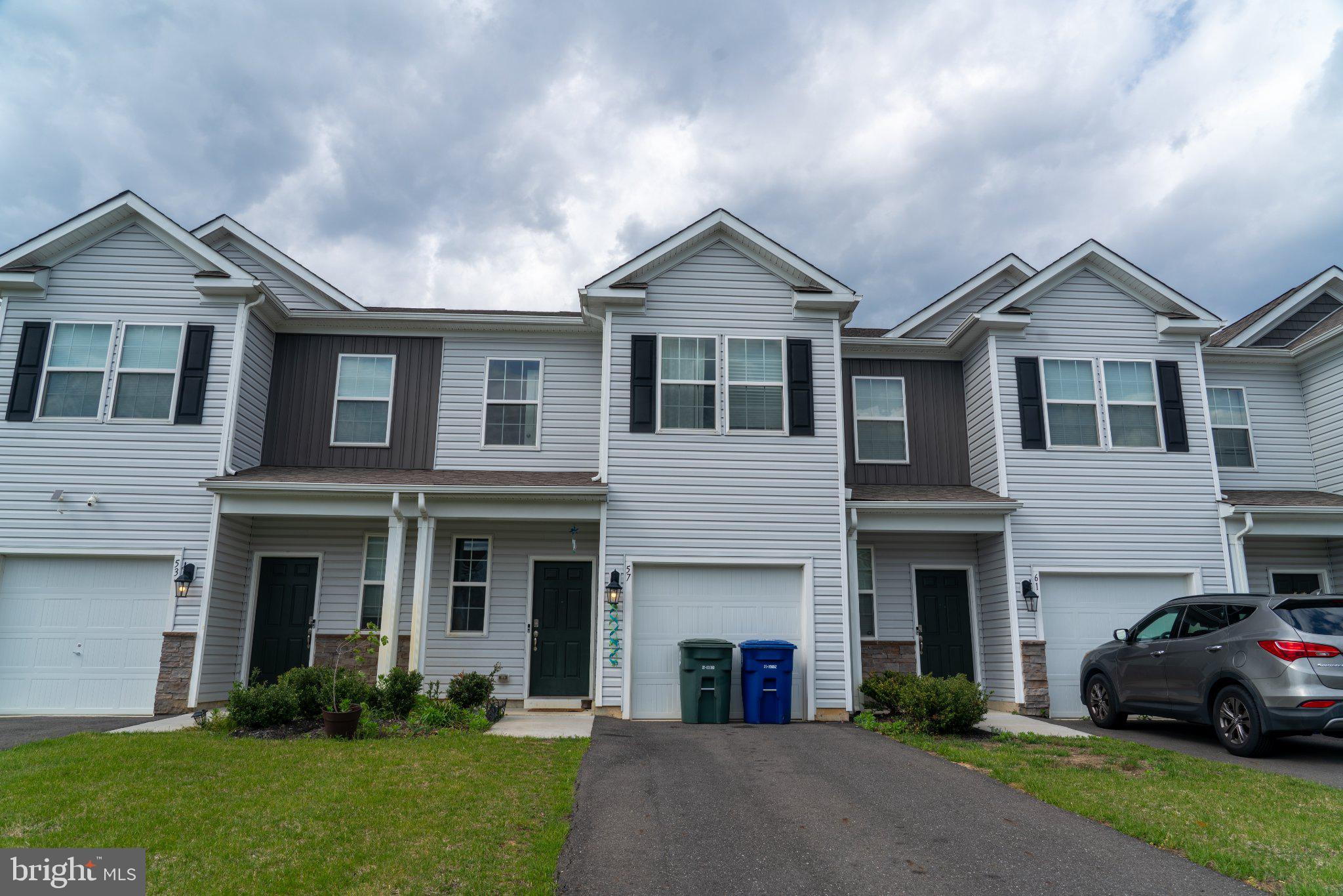 57 Arlotta Street Glassboro, NJ 08028 - Photo 1 of 17 a front view of a house with a yard