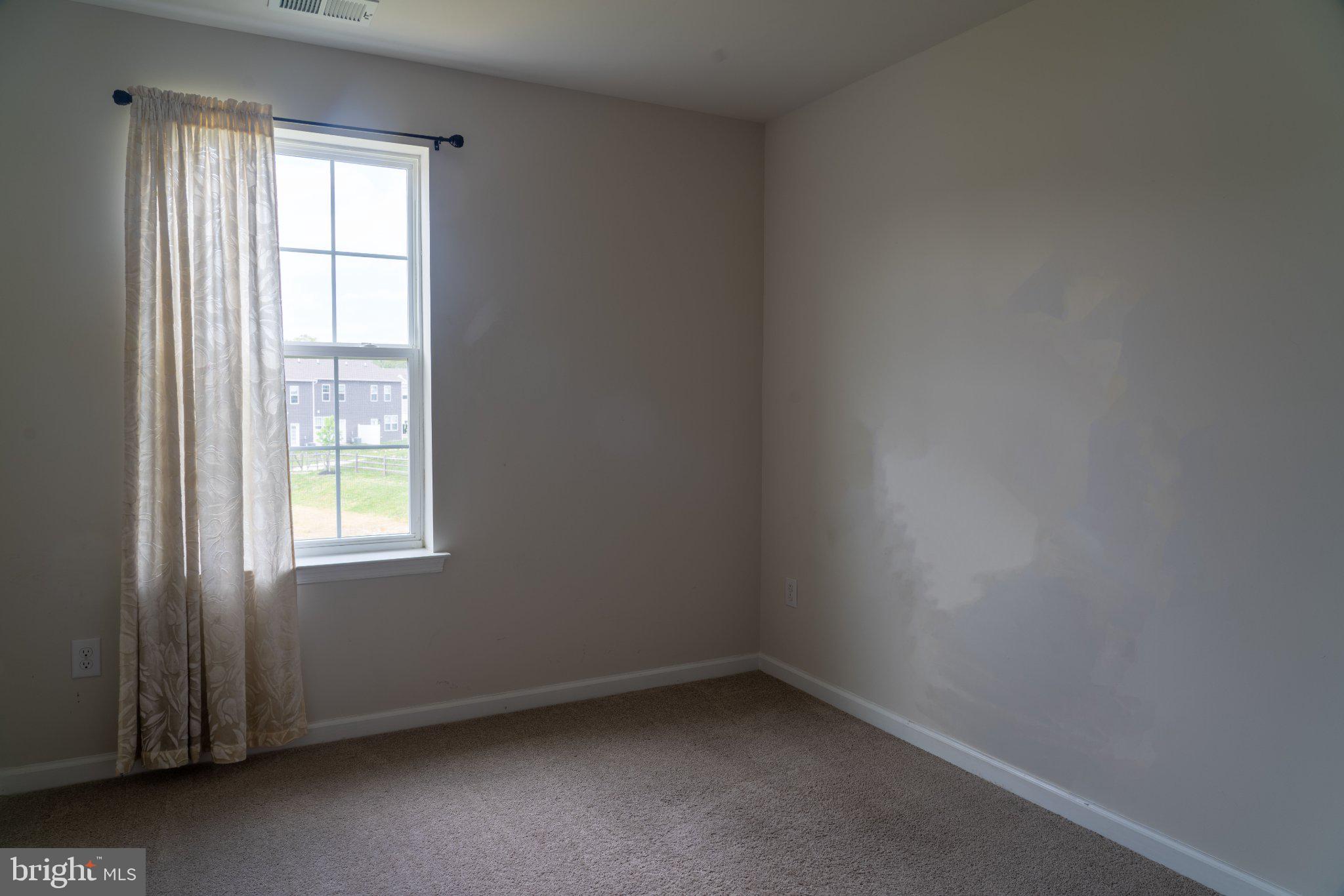 57 Arlotta Street Glassboro, NJ 08028 - Photo 13 of 17 an empty room with a window