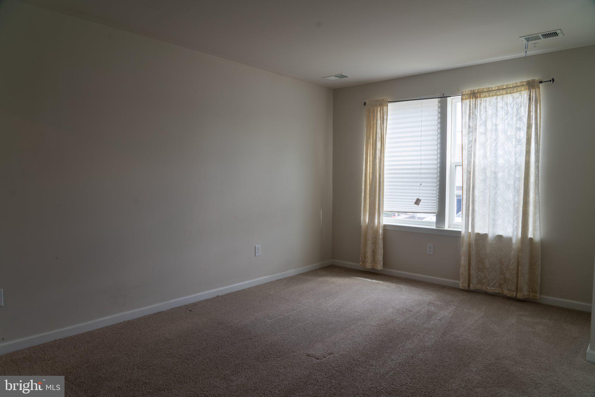 57 Arlotta Street Glassboro, NJ 08028 - Photo 7 of 17 an empty room with a window