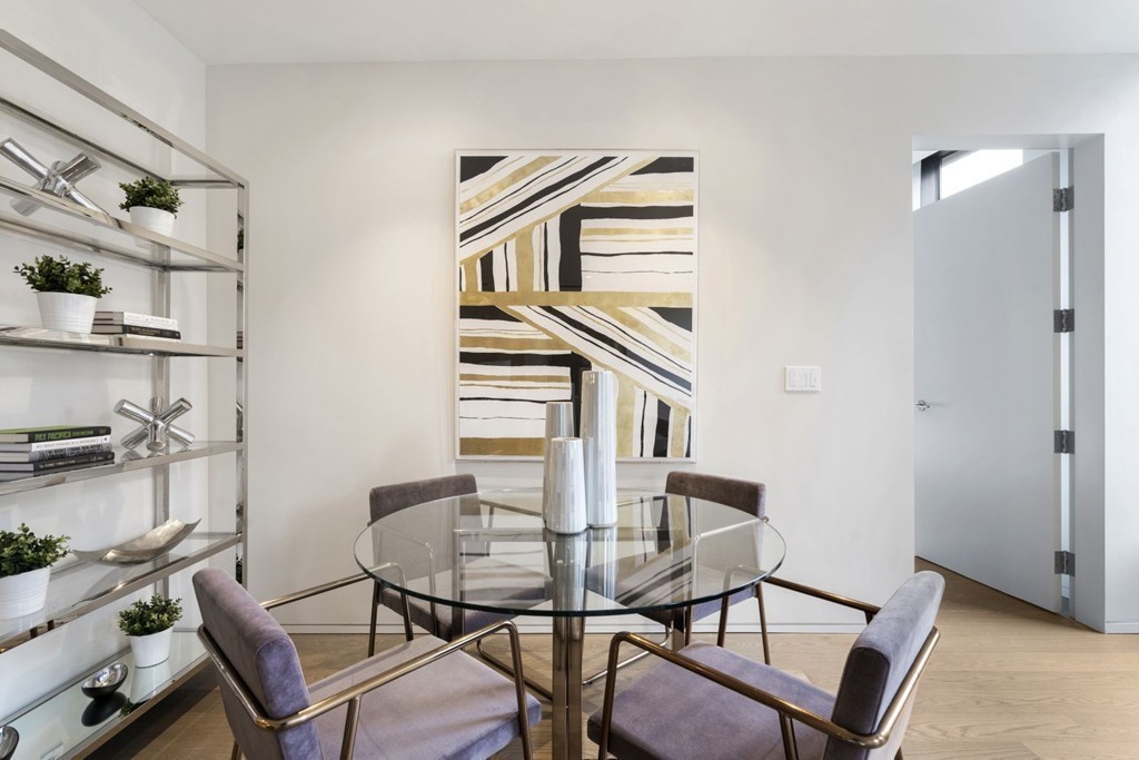 10 Farnsworth Street, Unit 5B Boston, MA 02210 - Photo 12 of 35 a view of a dining room with furniture
