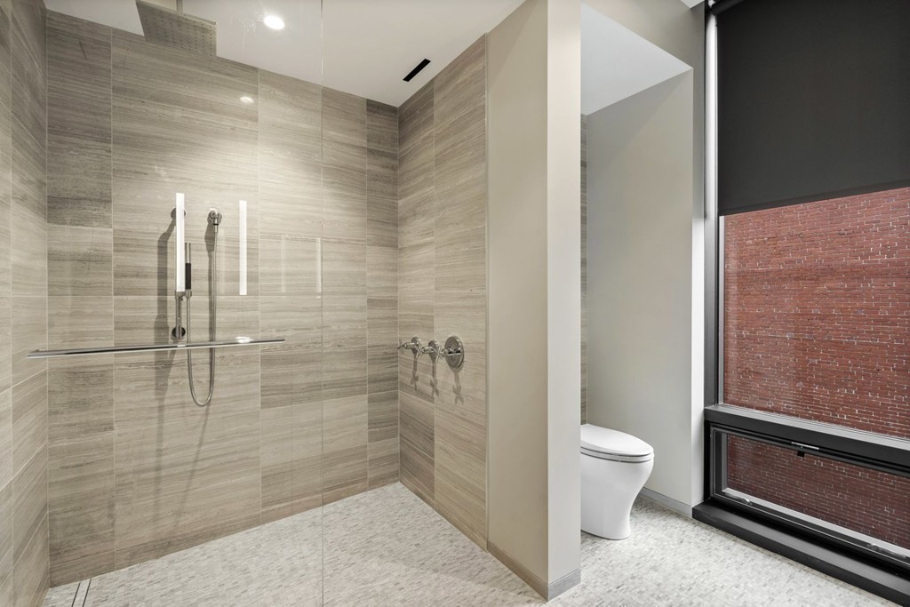 10 Farnsworth Street, Unit 5B Boston, MA 02210 - Photo 19 of 35 a bathroom with a shower