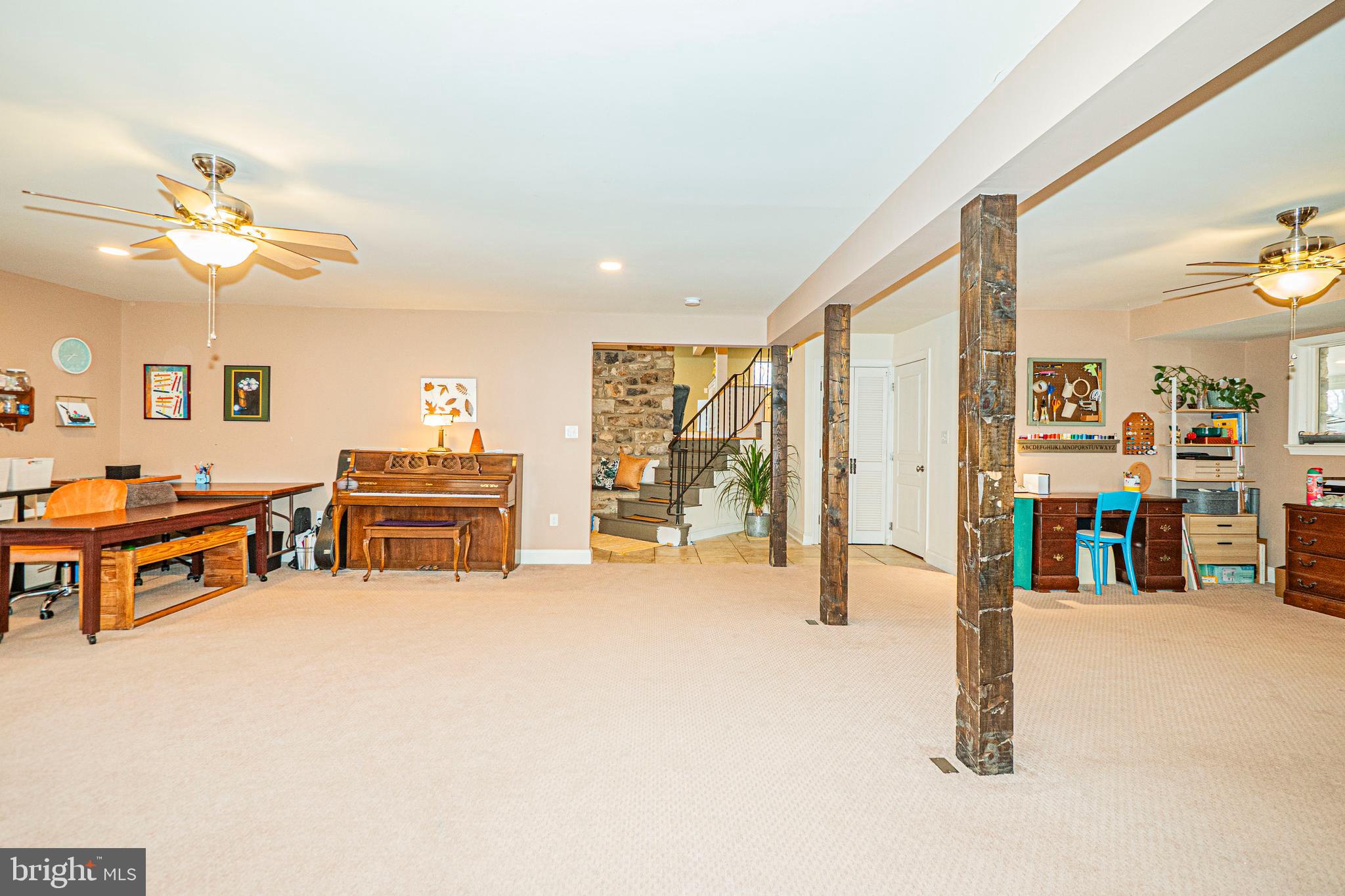 16834 Buck Lantz Road Sabillasville, MD 21780 - Photo 8 of 81 a living room with furniture and a flat screen tv