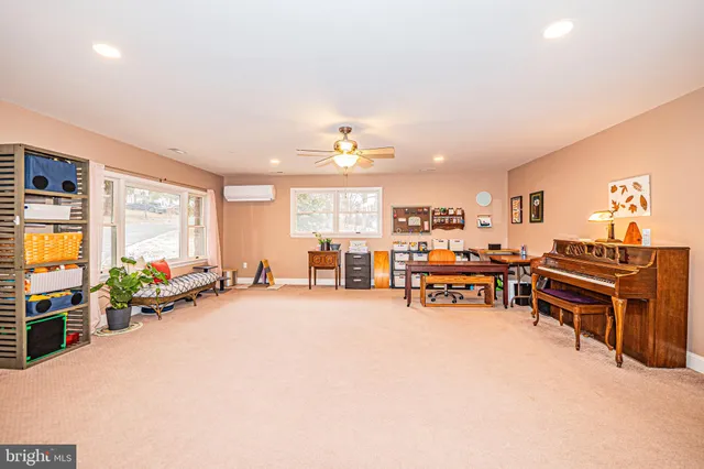 a kitchen with granite countertop a sink stove and cabinets