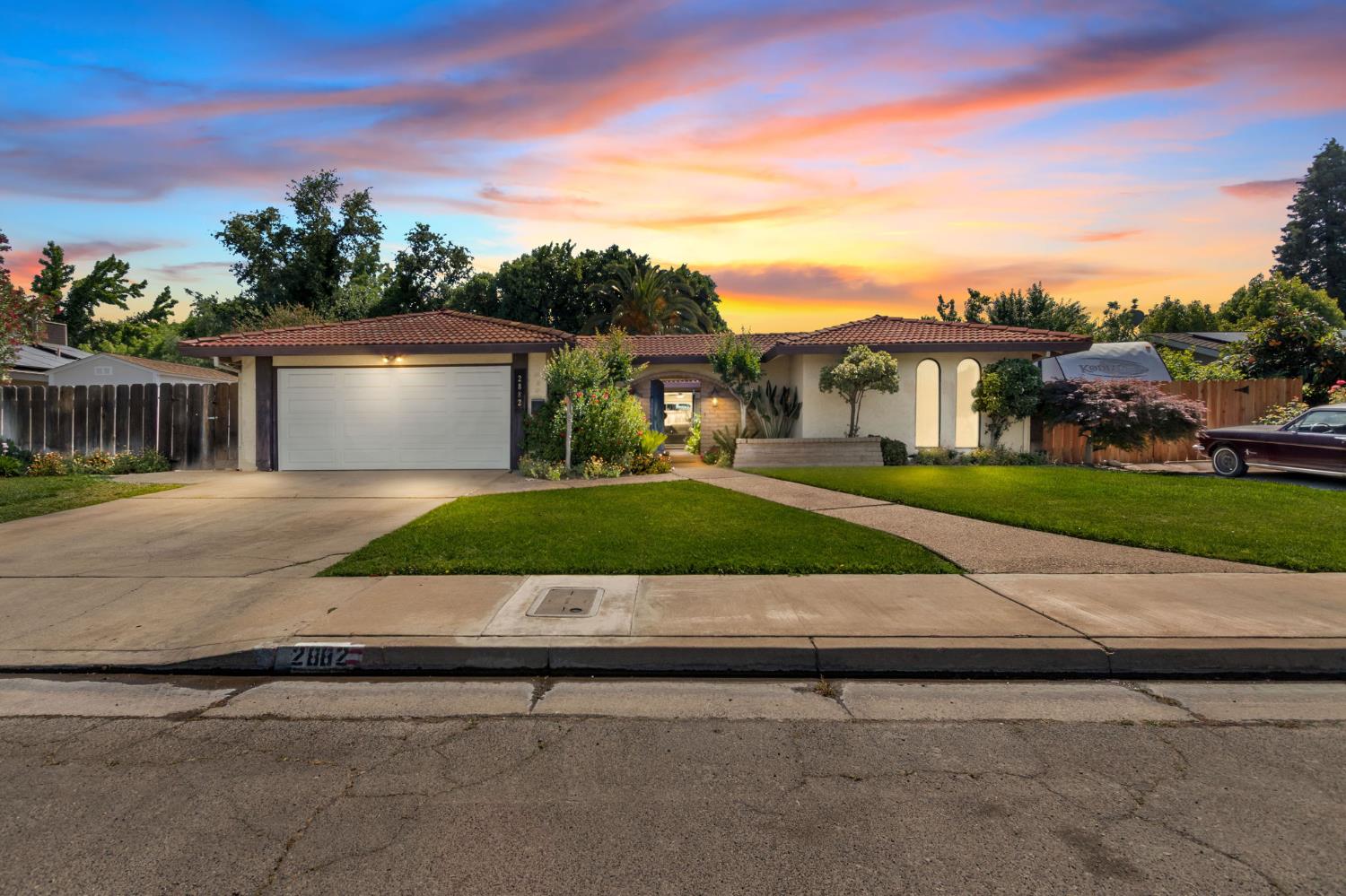 2882 El Camino Real Merced, CA 95340 - Photo 1 of 32 a view of a house with a yard