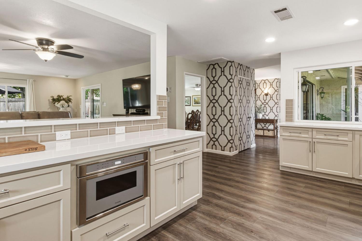 2882 El Camino Real Merced, CA 95340 - Photo 12 of 32 a view of kitchen with cabinets and wooden floor