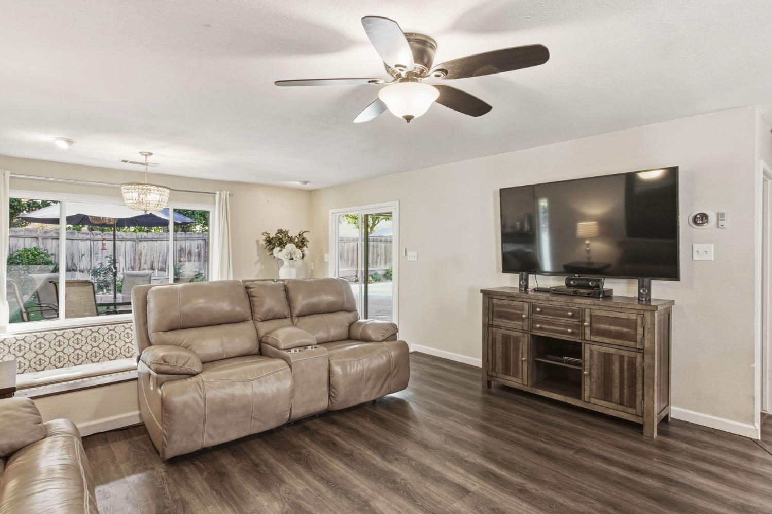 2882 El Camino Real Merced, CA 95340 - Photo 14 of 32 a living room with furniture and a flat screen tv