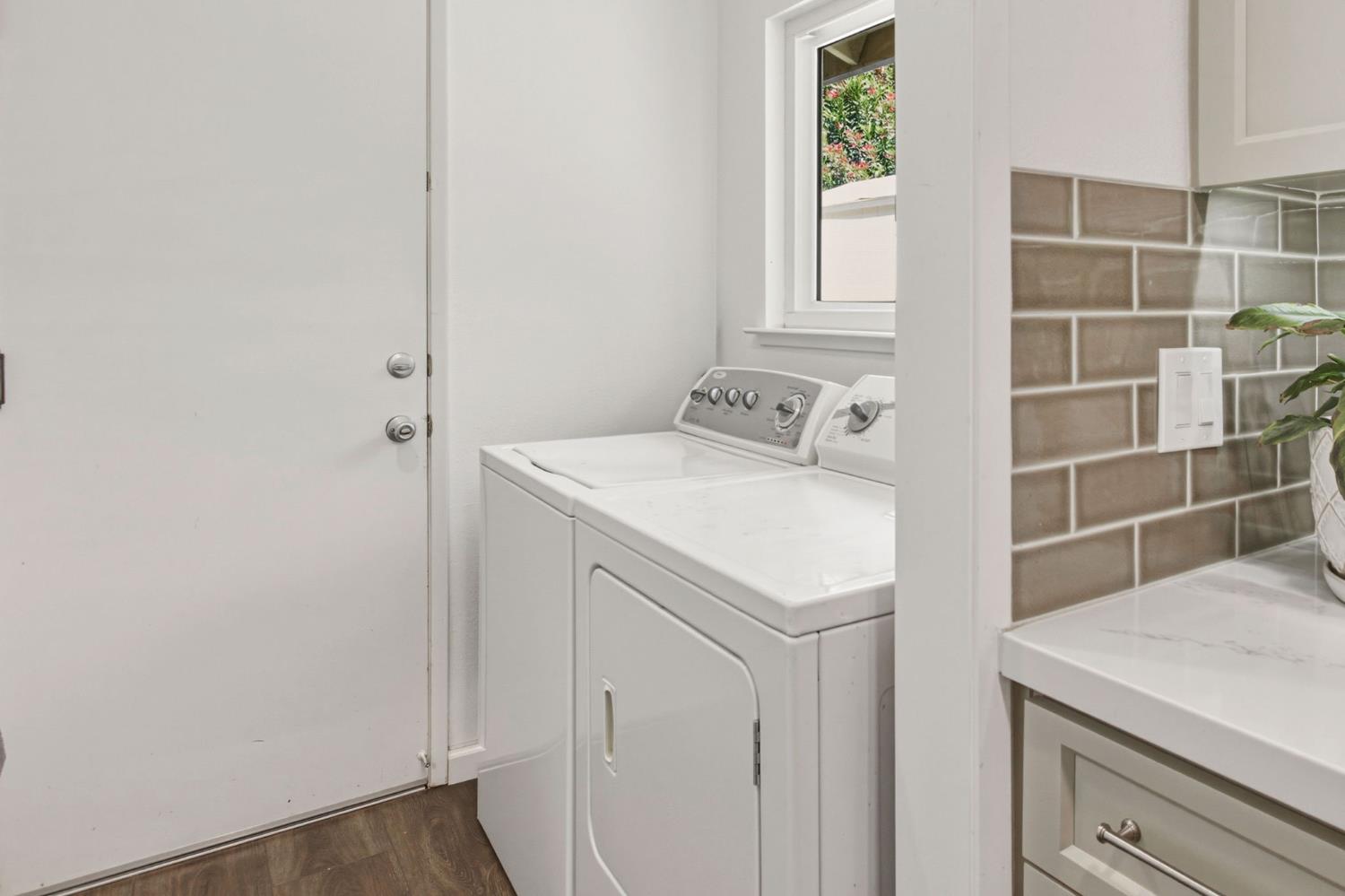 2882 El Camino Real Merced, CA 95340 - Photo 17 of 32 a utility room with dryer and washer