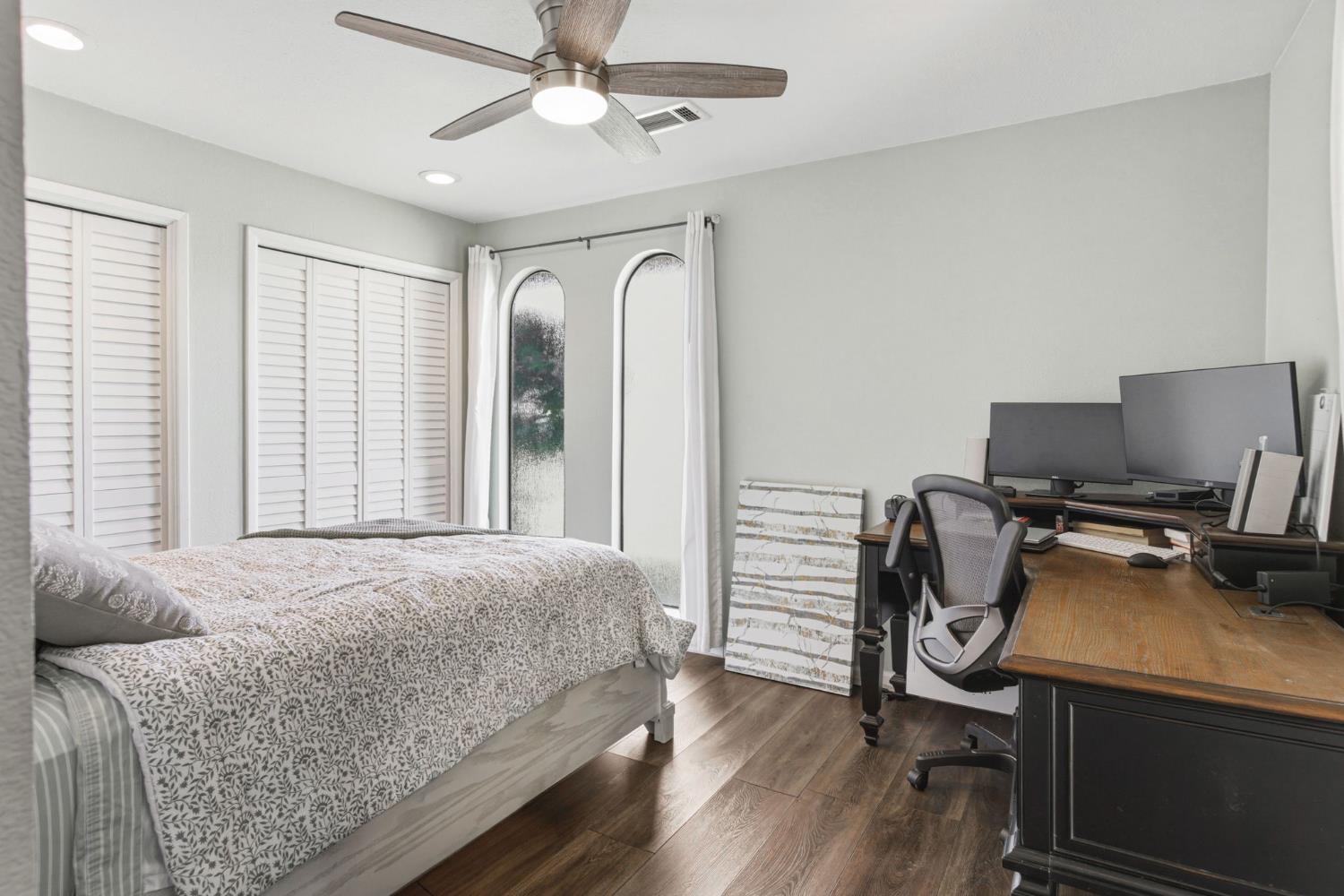 2882 El Camino Real Merced, CA 95340 - Photo 21 of 32 a bedroom with a bed and a window
