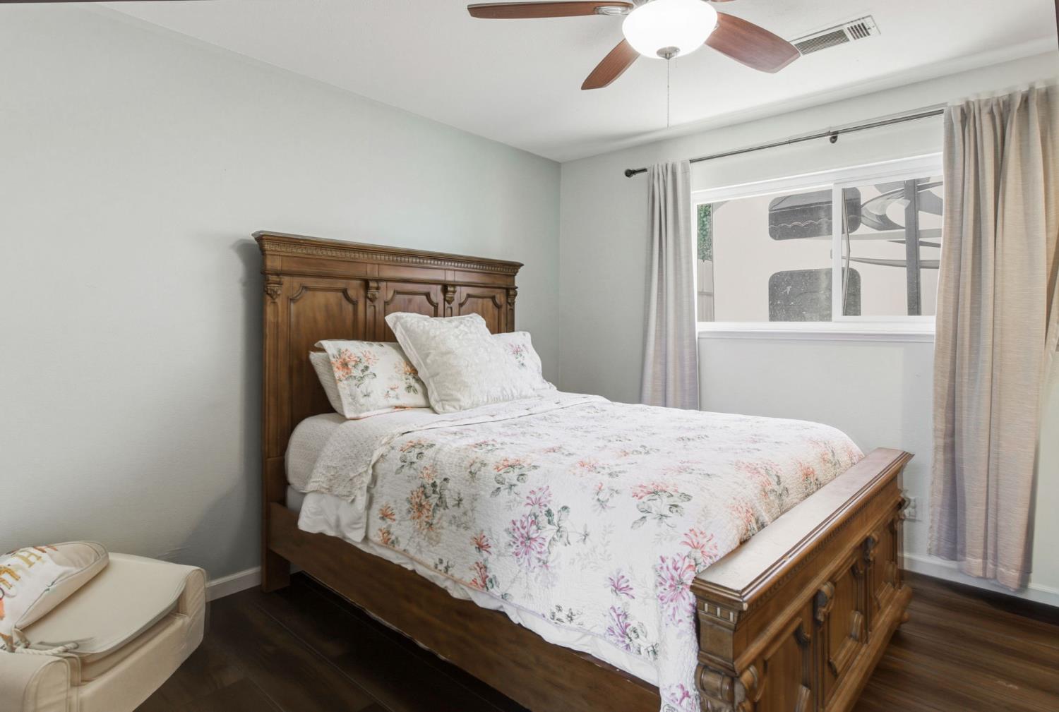 2882 El Camino Real Merced, CA 95340 - Photo 26 of 32 a bedroom with a bed and window