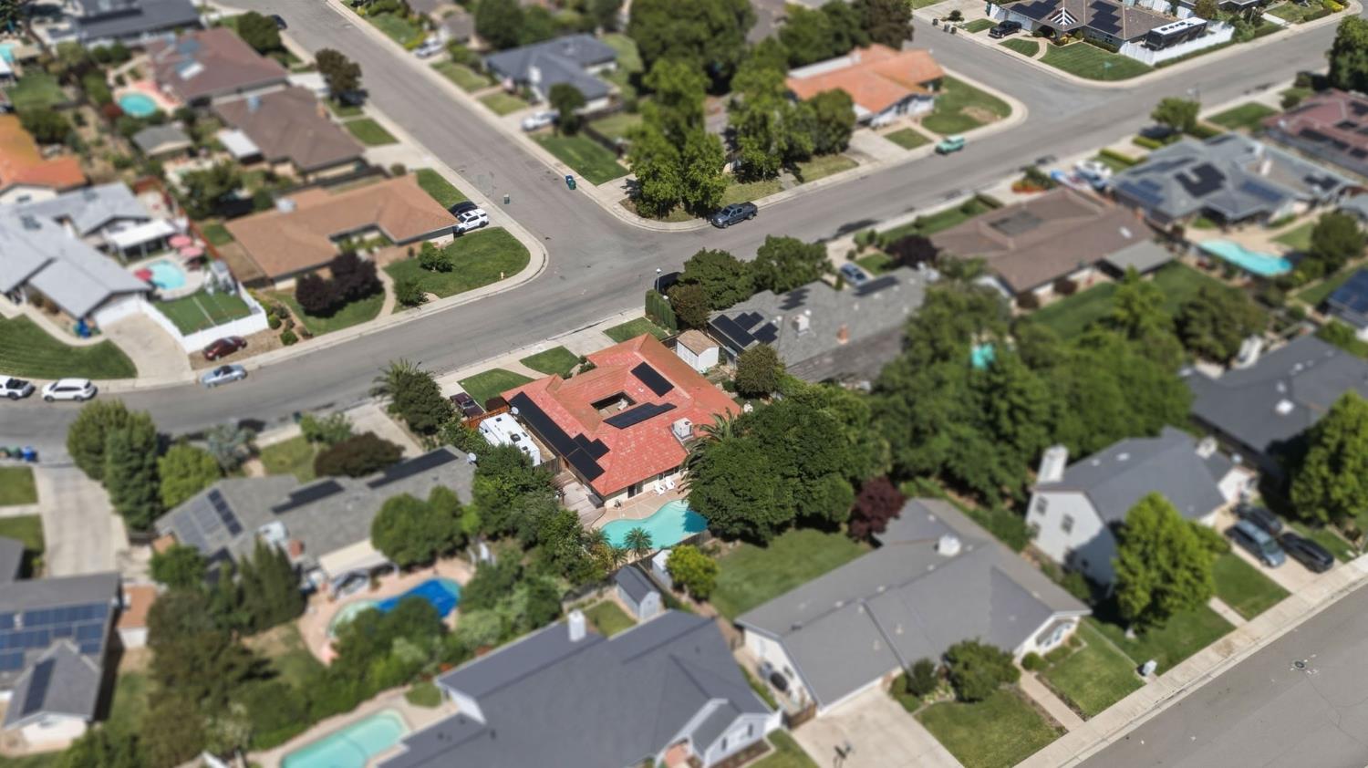 2882 El Camino Real Merced, CA 95340 - Photo 30 of 32 an aerial view of a city with lots of residential buildings