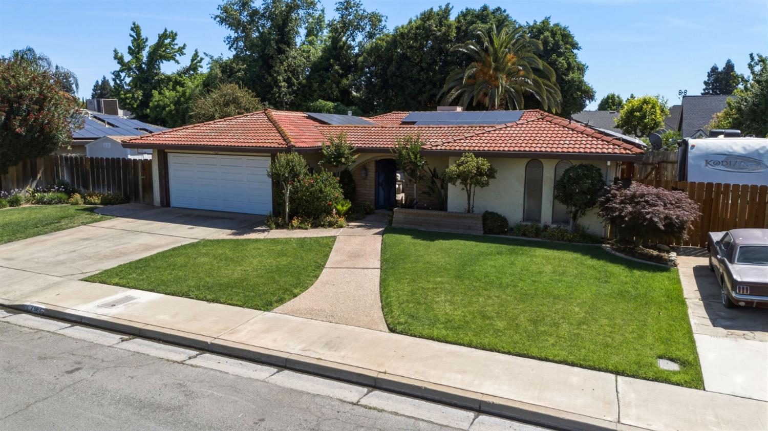 2882 El Camino Real Merced, CA 95340 - Photo 3 of 32 a view of a house with a garden