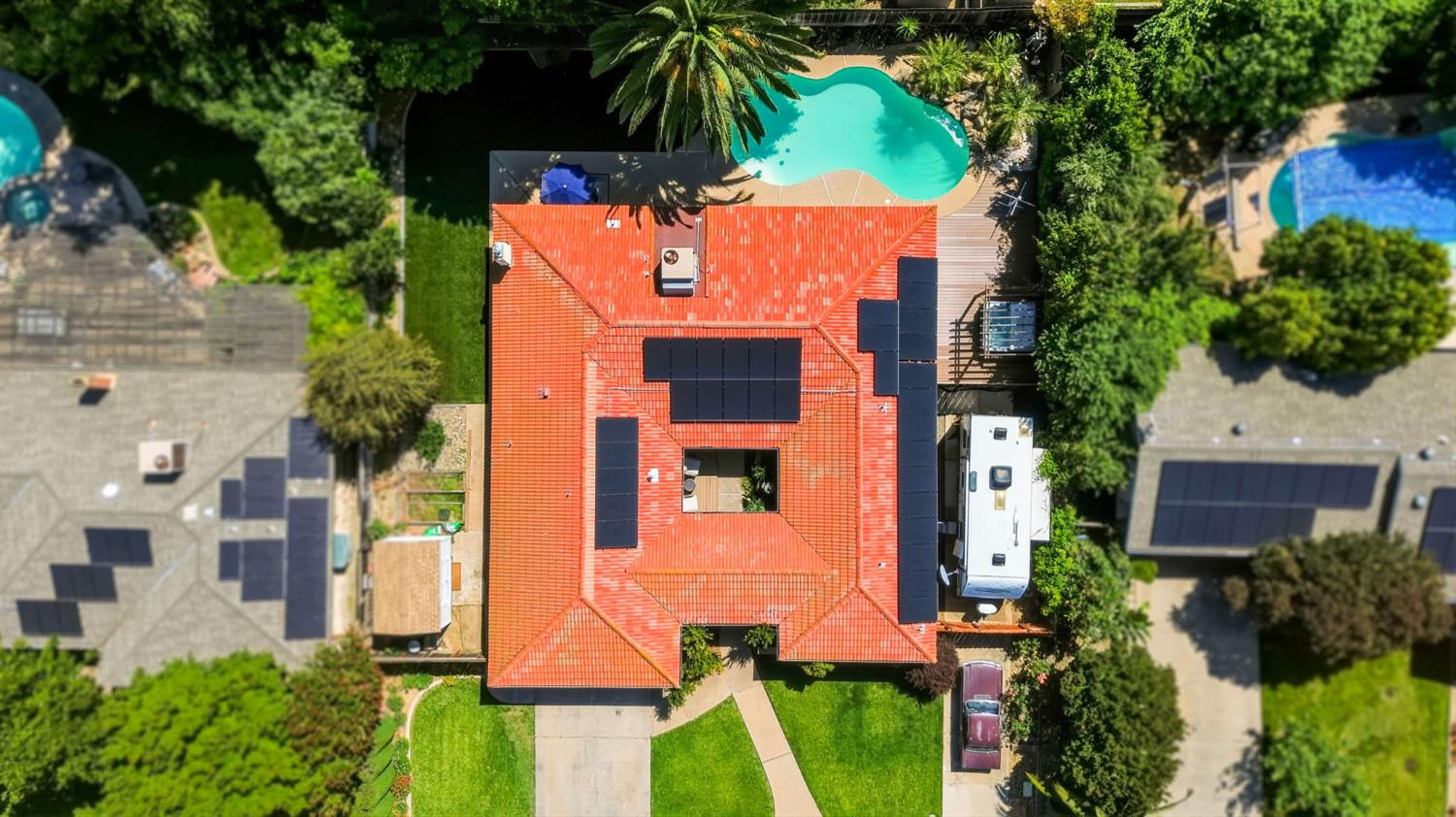 2882 El Camino Real Merced, CA 95340 - Photo 31 of 32 an aerial view of a house with a yard and potted plants