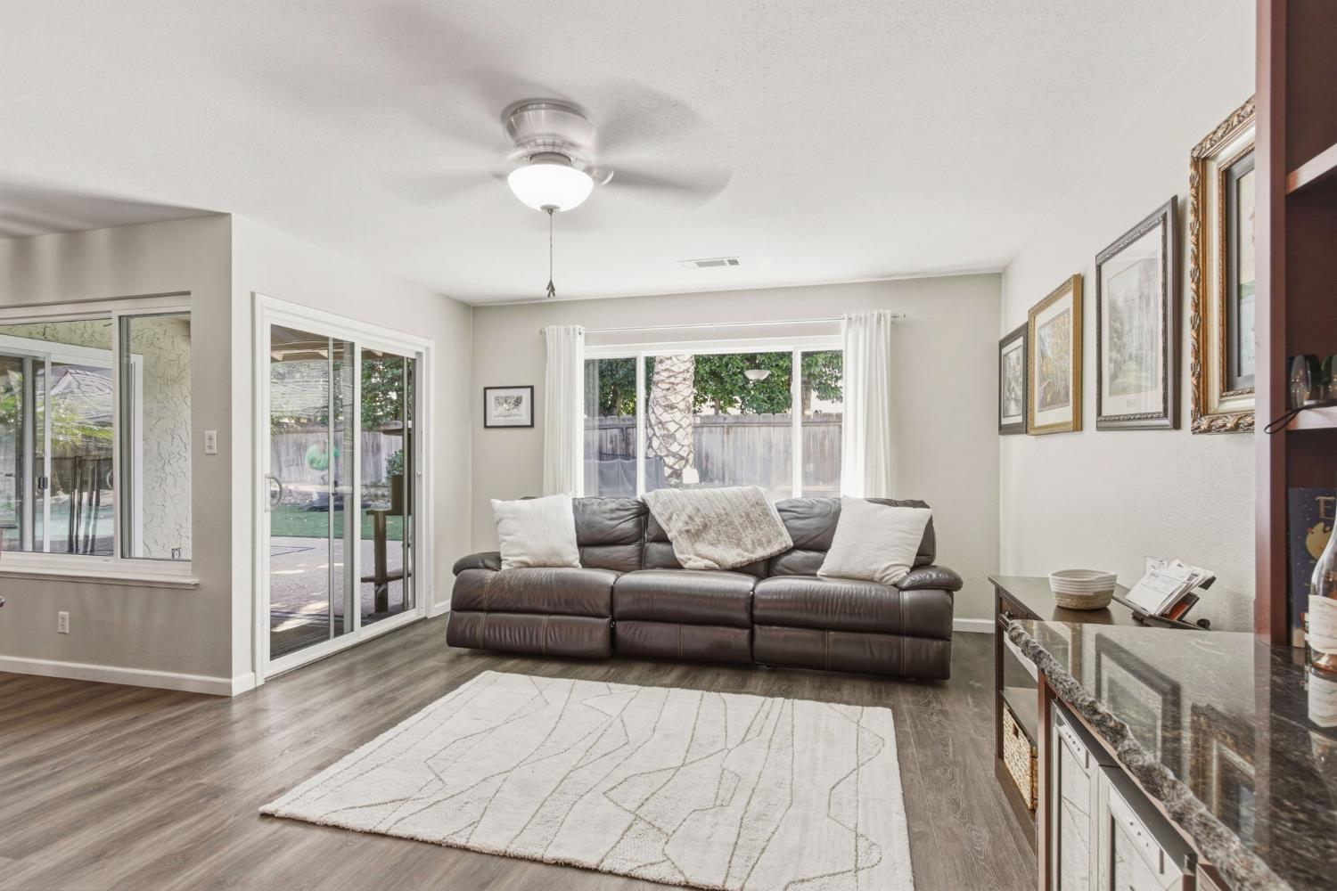 2882 El Camino Real Merced, CA 95340 - Photo 5 of 32 a living room with furniture and wooden floor