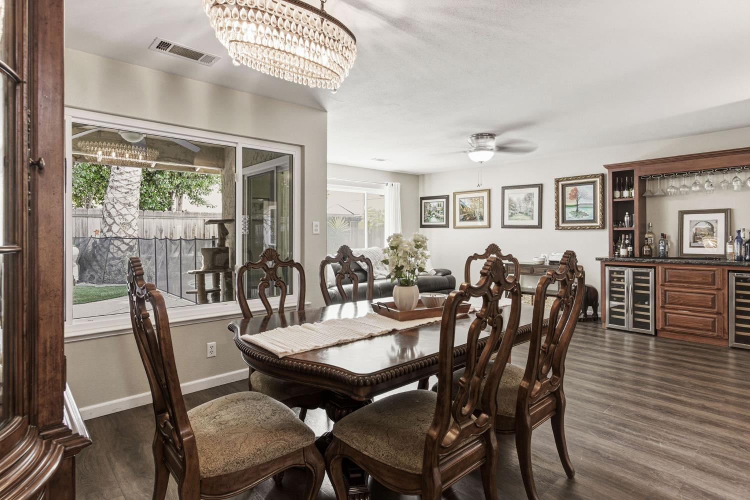 2882 El Camino Real Merced, CA 95340 - Photo 9 of 32 a view of a dining room with furniture window and wooden floor