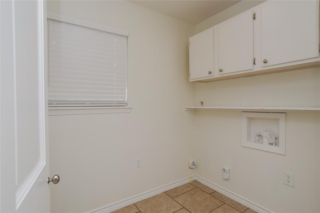 3999 Speegleville Road Waco, TX 76712 - Photo 21 of 34 Spacious laundry room, with good storage.