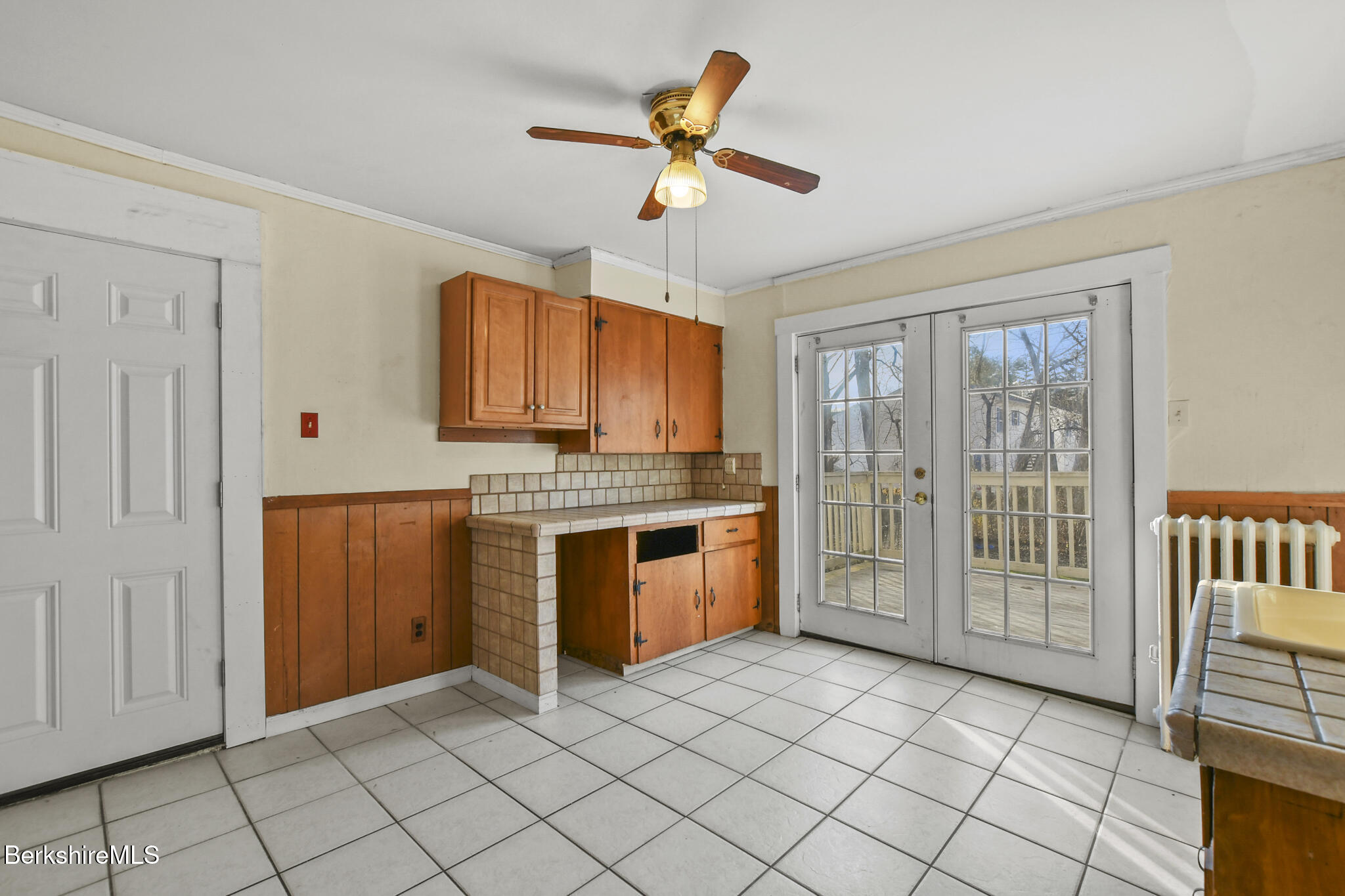 21 Pacific Street Pittsfield, MA 01201 - Photo 13 of 29 a kitchen with granite countertop a stove a sink and a refrigerator