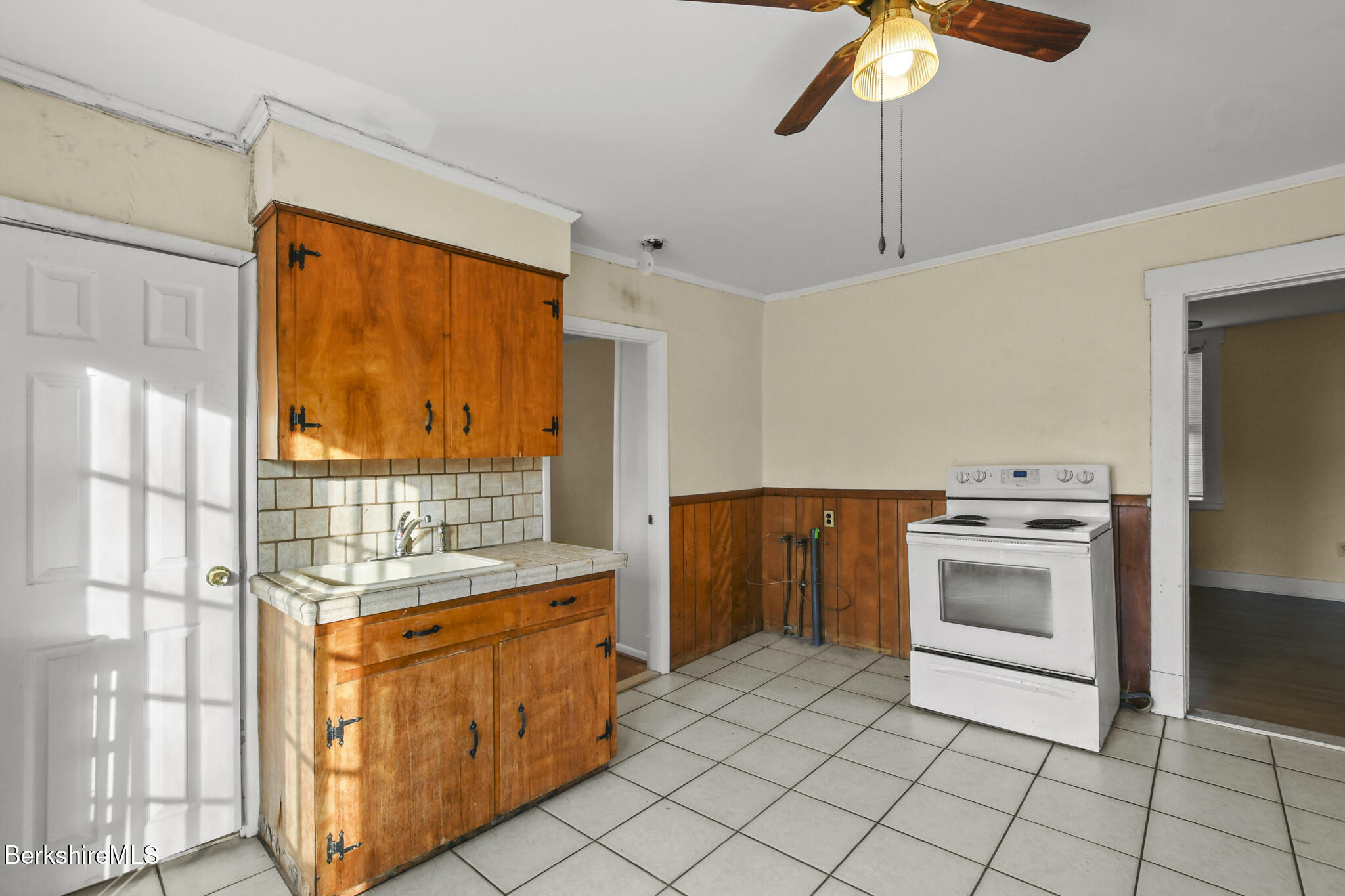 21 Pacific Street Pittsfield, MA 01201 - Photo 15 of 29 a kitchen with stainless steel appliances granite countertop a stove a sink and a refrigerator