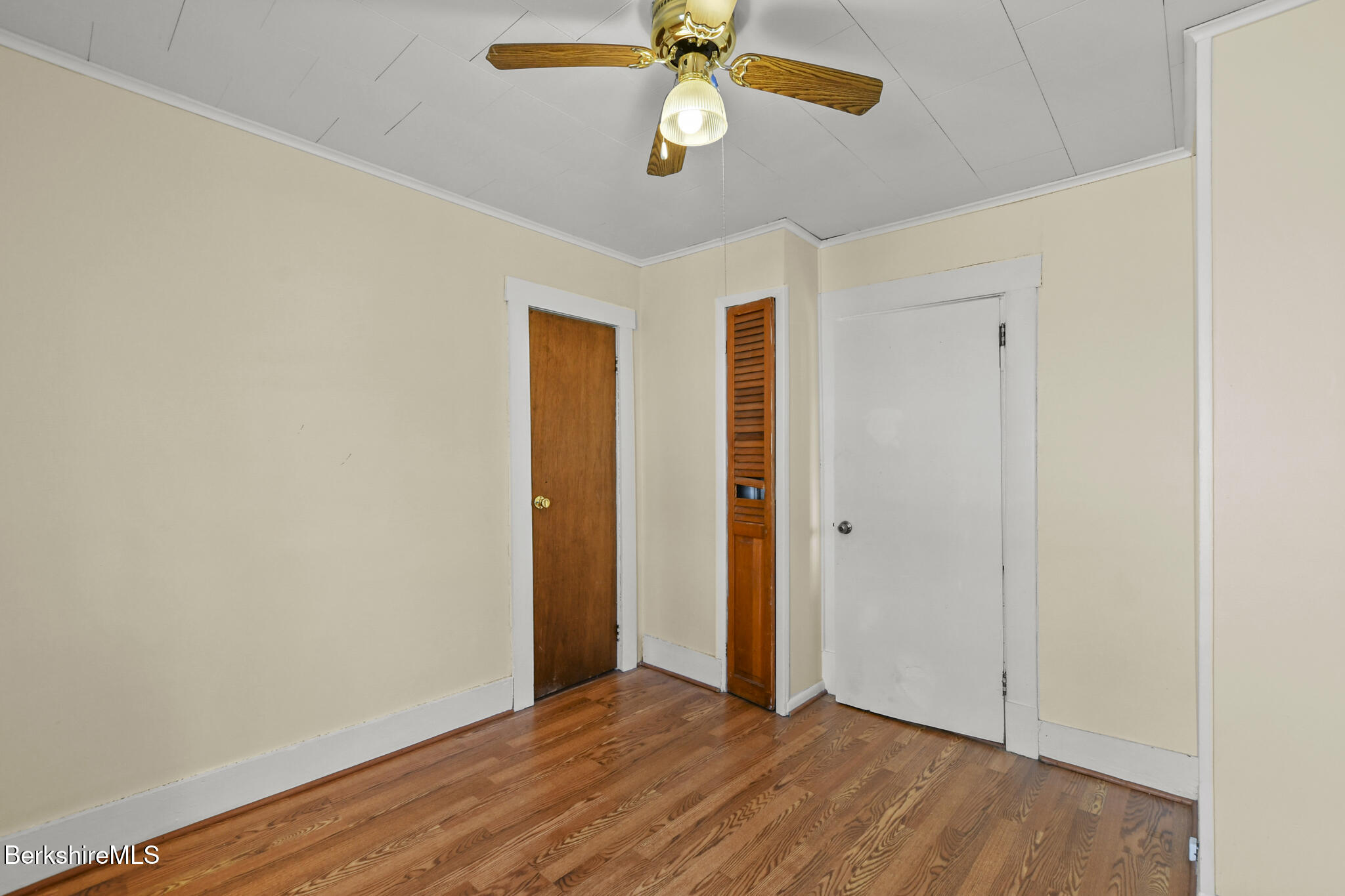 21 Pacific Street Pittsfield, MA 01201 - Photo 19 of 29 wooden floor in an empty room