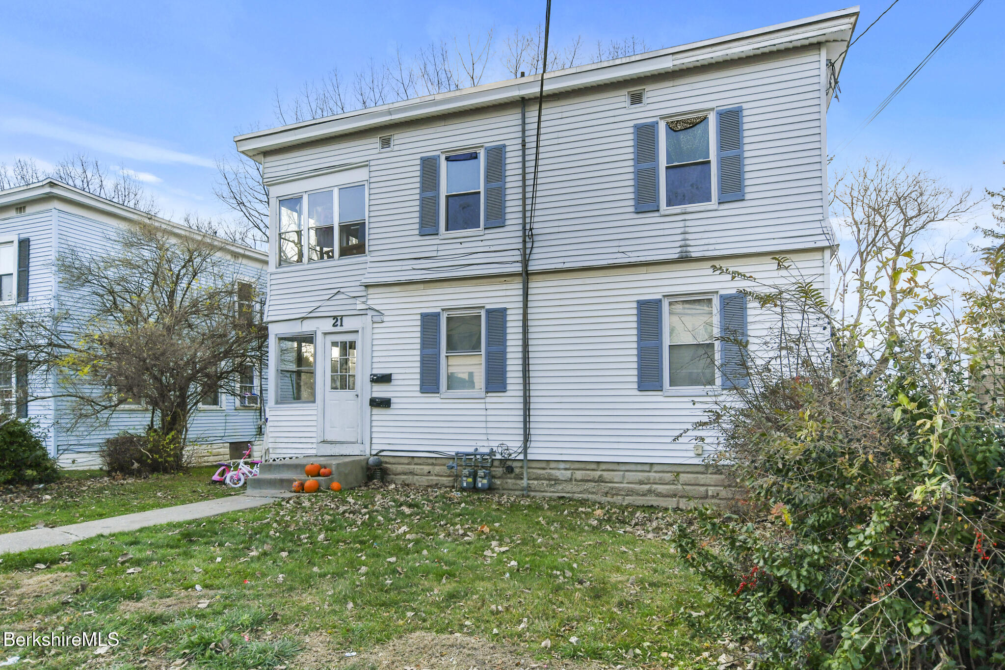 21 Pacific Street Pittsfield, MA 01201 - Photo 2 of 29 a front view of a house with a yard