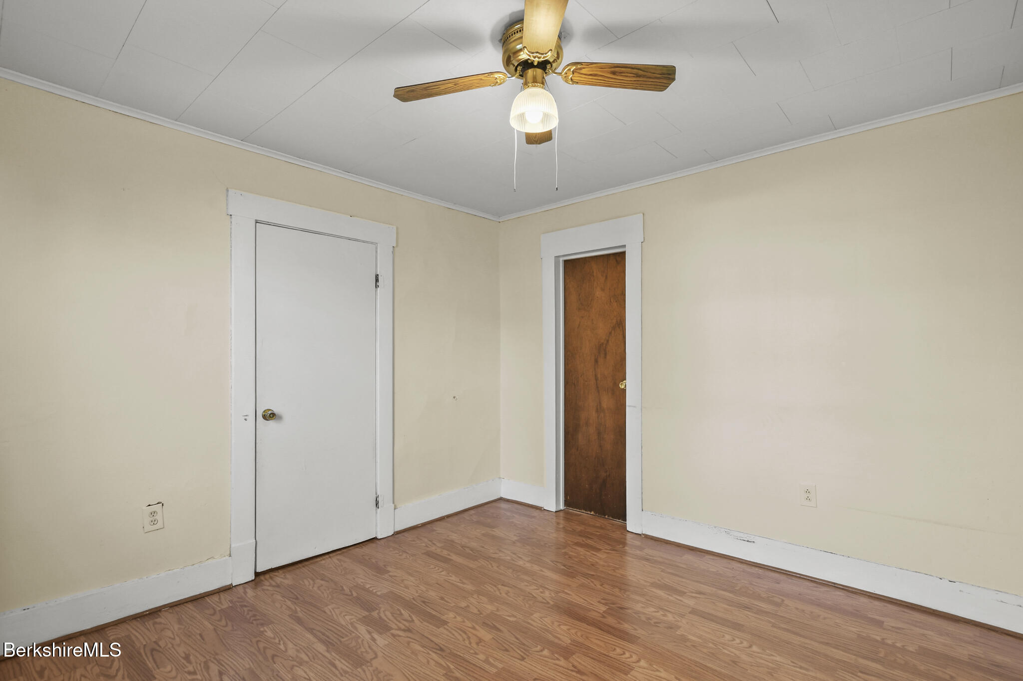 21 Pacific Street Pittsfield, MA 01201 - Photo 22 of 29 a view of an empty room and chandelier fan