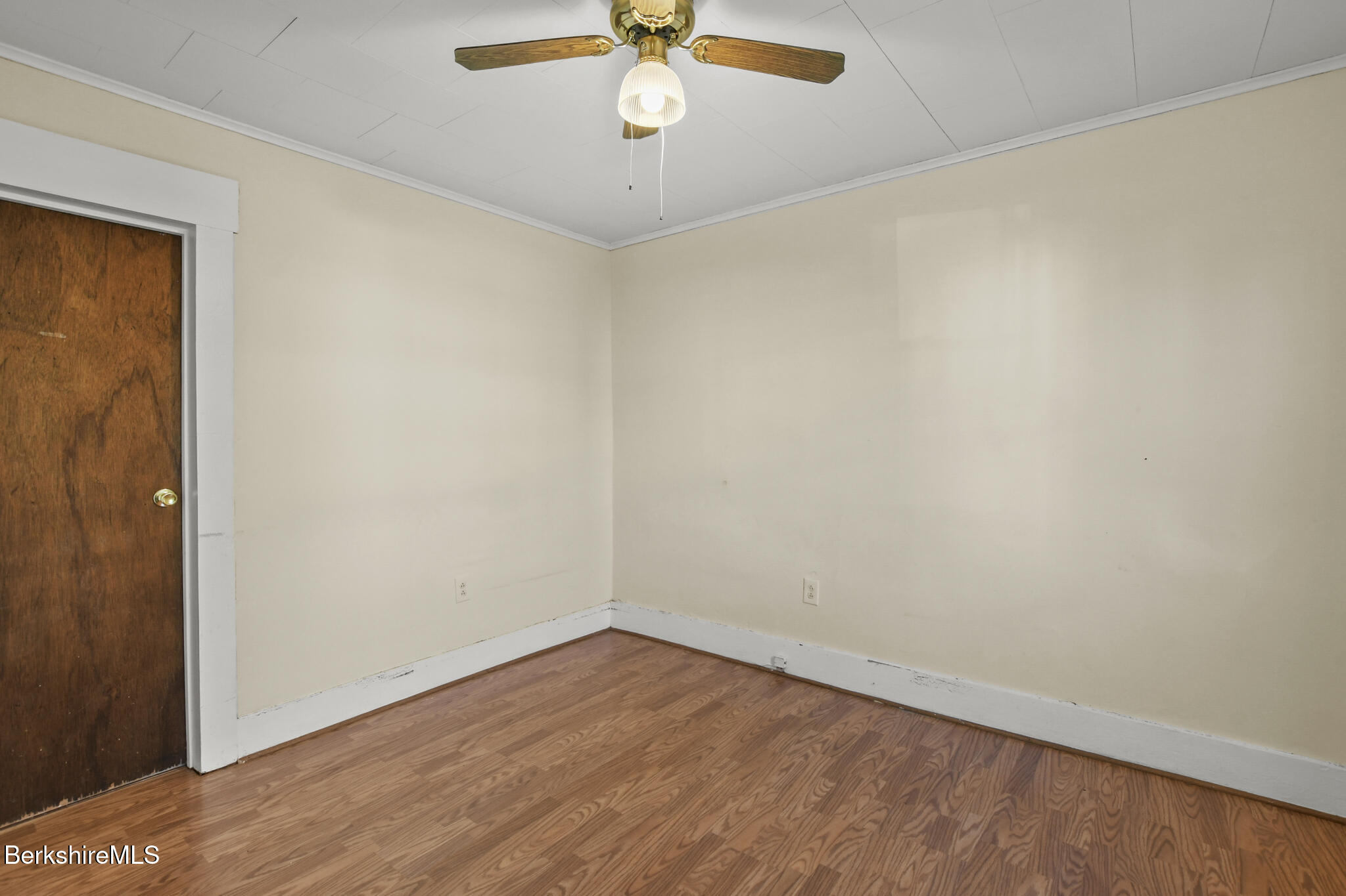 21 Pacific Street Pittsfield, MA 01201 - Photo 23 of 29 wooden floor in an empty room