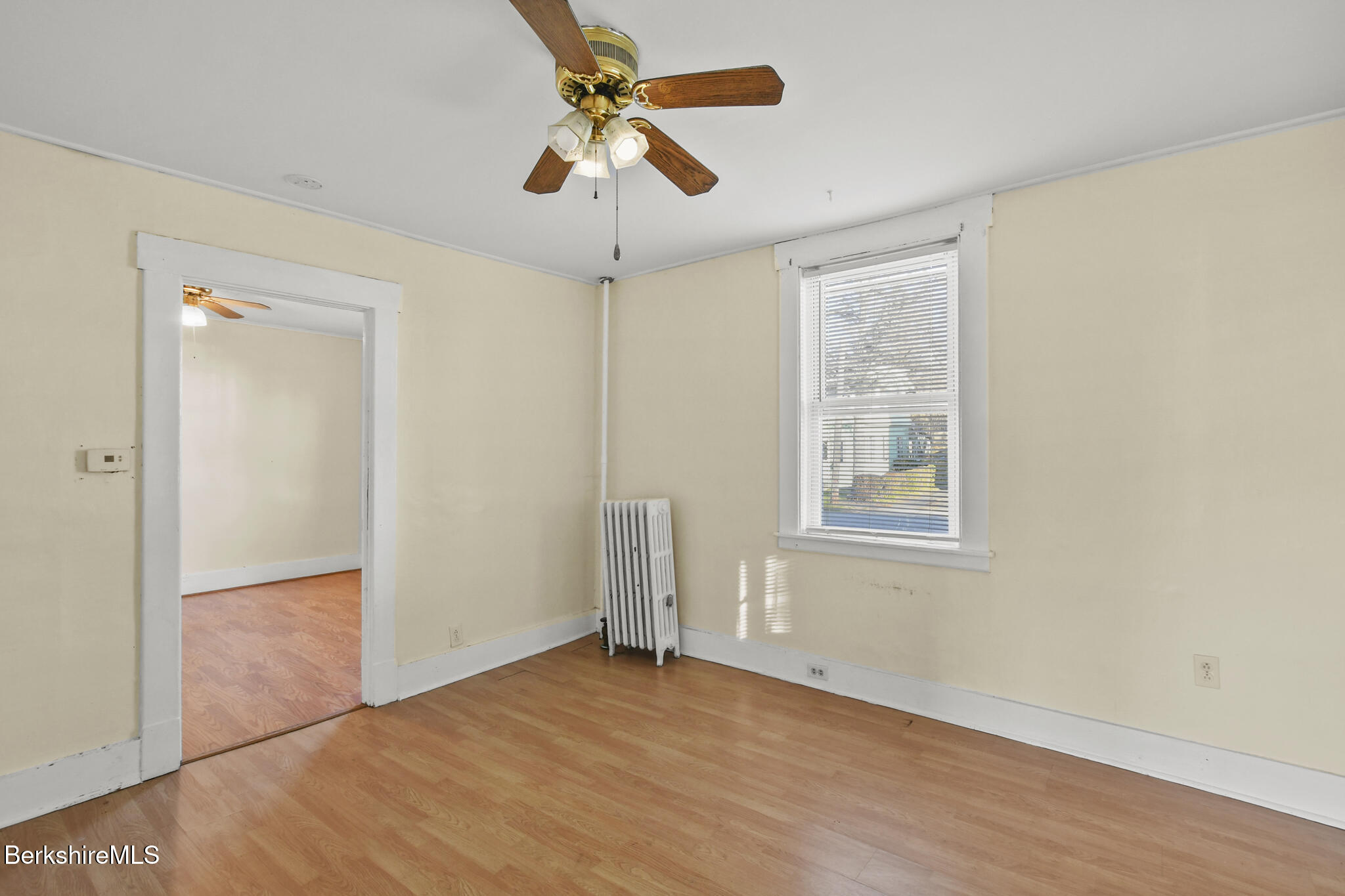 21 Pacific Street Pittsfield, MA 01201 - Photo 25 of 29 an empty room with fan and windows