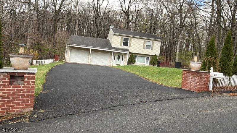 22 Karen Road Vernon, NJ 07422 - Photo 2 of 26 front view of a house with a yard