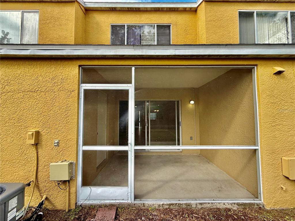 29920 Playa Del Rey Lane Wesley Chapel, FL 33543 - Photo 16 of 32 a view of a building with door