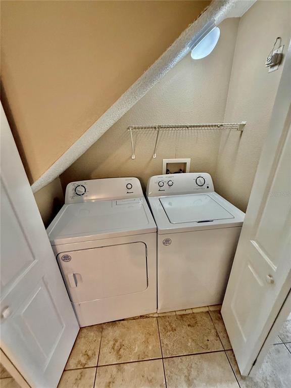 29920 Playa Del Rey Lane Wesley Chapel, FL 33543 - Photo 20 of 32 a utility room with dryer and washer