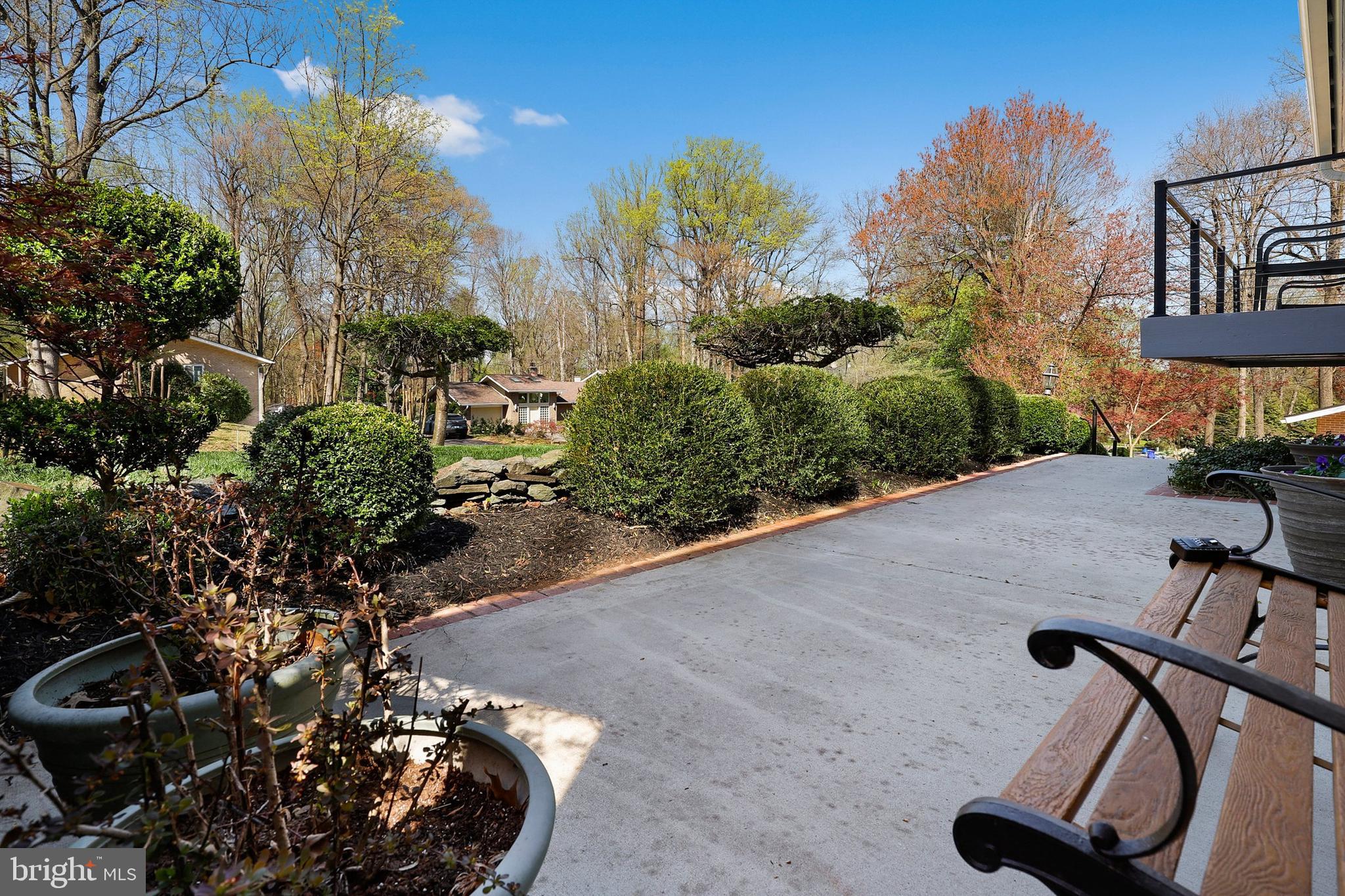 7616 Hamilton Spring Road Bethesda, MD 20817 - Photo 8 of 64 a view of a house with a backyard