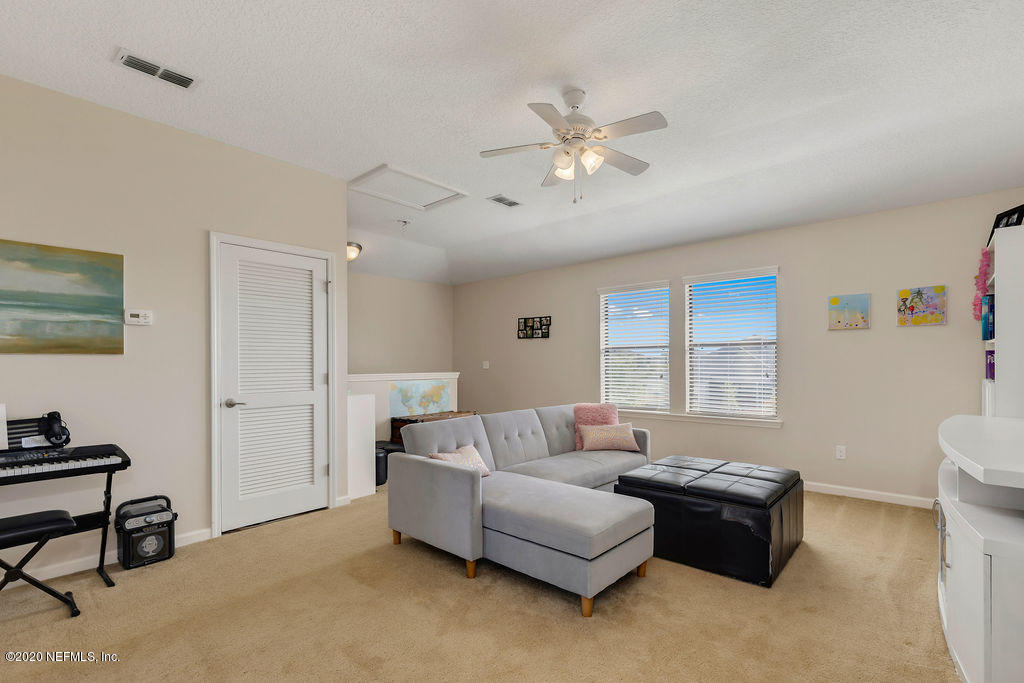 1737 North Cappero Drive St. Augustine, FL 32092 - Photo 23 of 47 a living room with furniture and a window