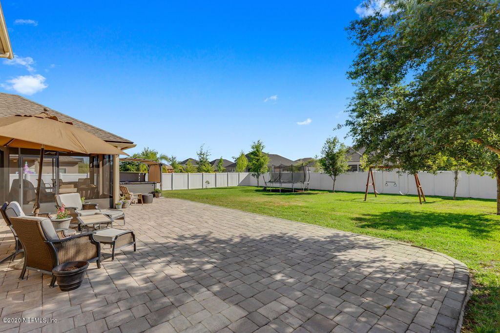 1737 North Cappero Drive St. Augustine, FL 32092 - Photo 33 of 47 a view of a house with a yard