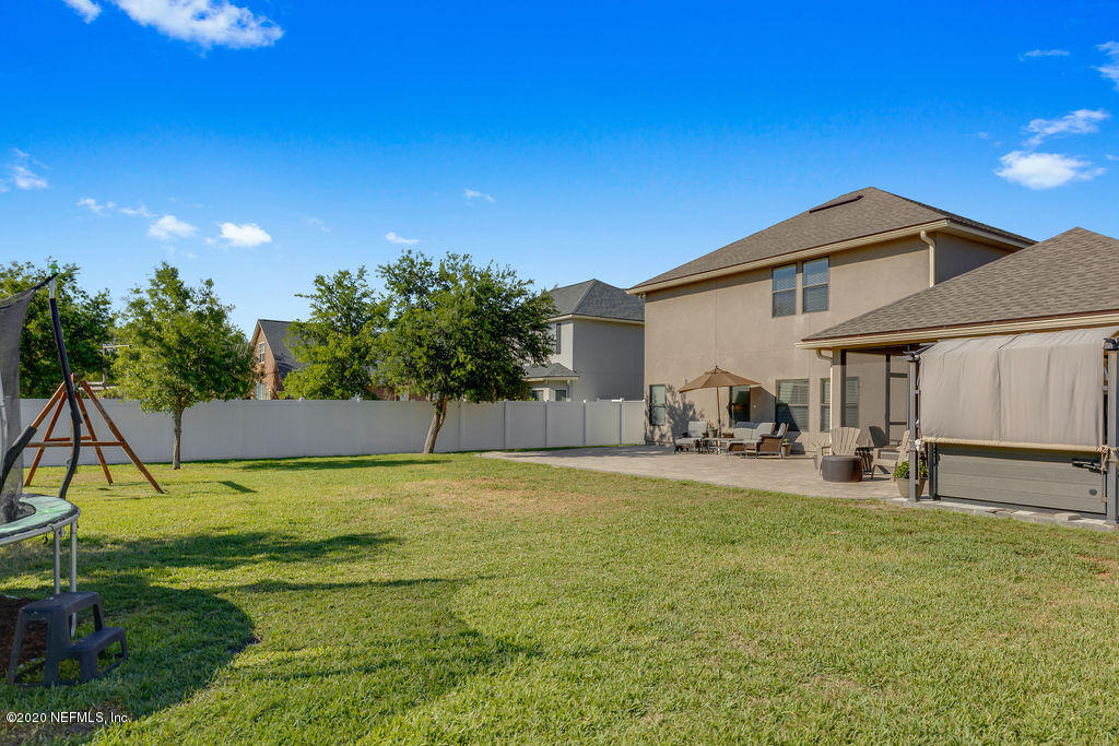 1737 North Cappero Drive St. Augustine, FL 32092 - Photo 35 of 47 a view of a house with swimming pool and sitting area