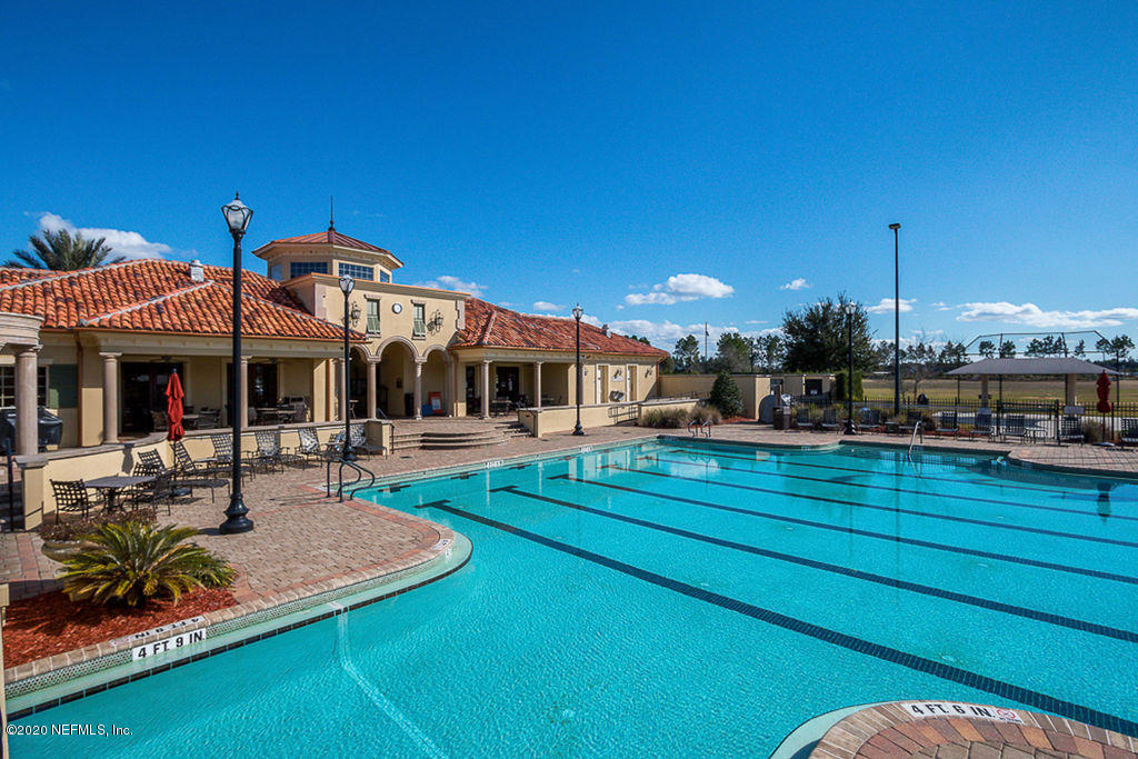 1737 North Cappero Drive St. Augustine, FL 32092 - Photo 40 of 47 a view of a house with sitting area and furniture