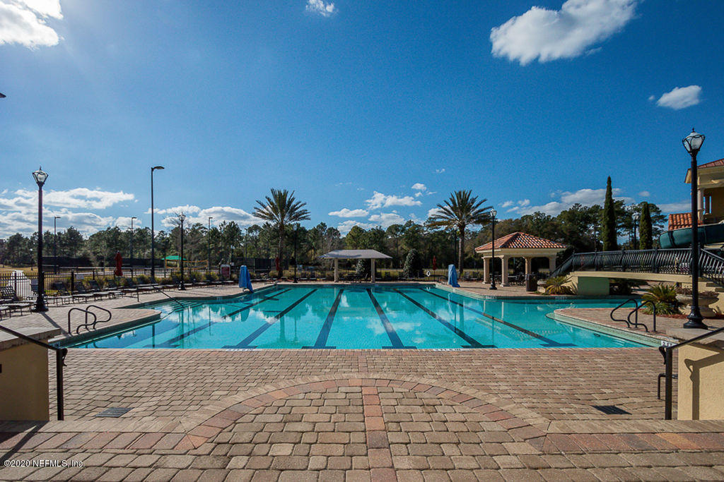 1737 North Cappero Drive St. Augustine, FL 32092 - Photo 43 of 47 a view of a swimming pool and lounge chairs