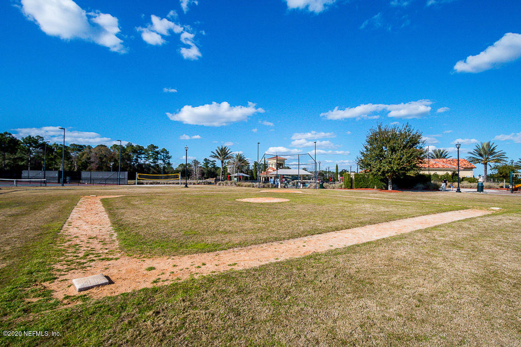 1737 North Cappero Drive St. Augustine, FL 32092 - Photo 46 of 47 a view of yard with swimming pool and outdoor seating