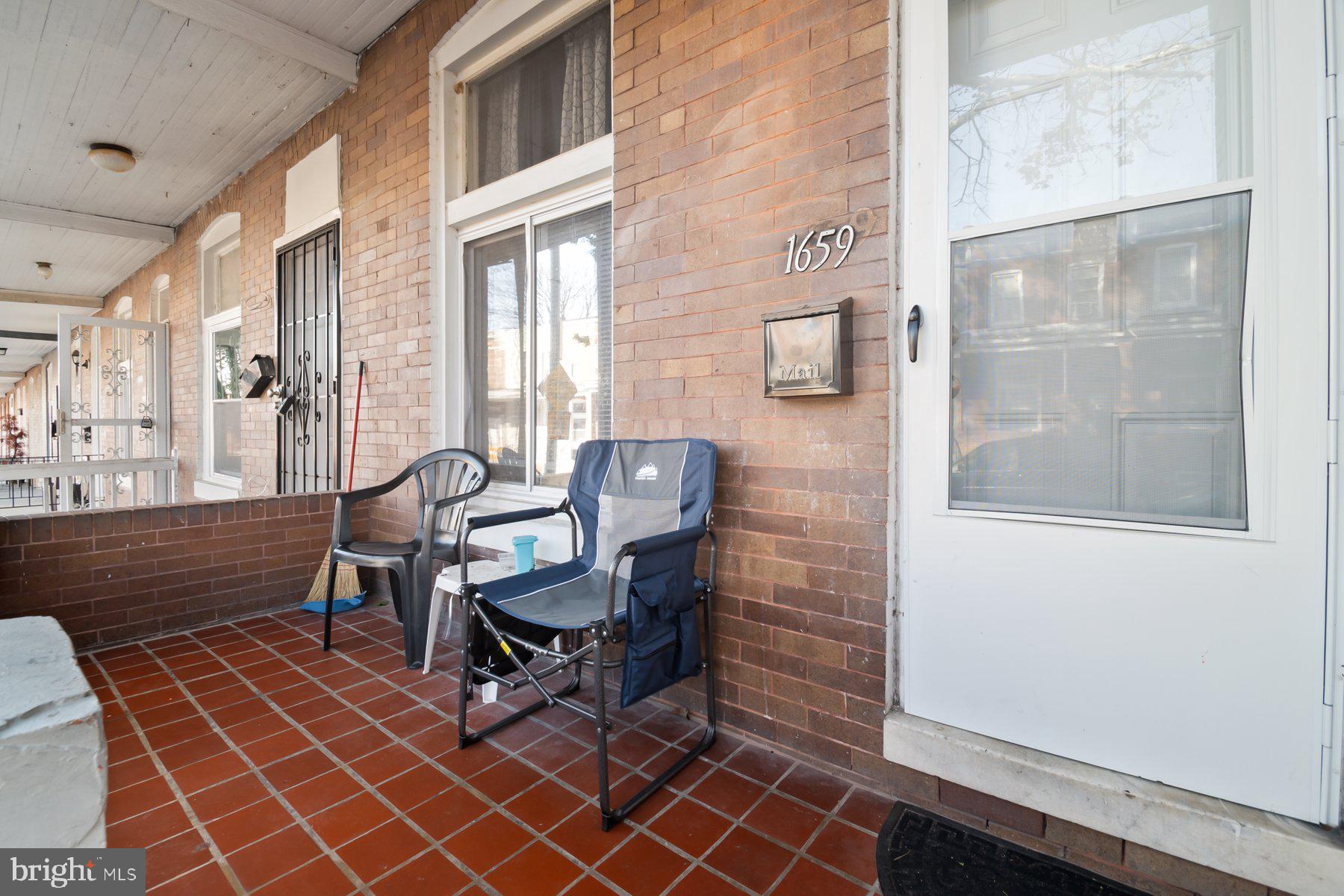 1659 Cliftview Avenue Baltimore, MD 21213 - Photo 3 of 25 a living room with furniture