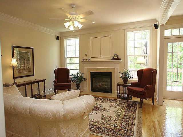 7264 Summit Waters Lane Raleigh, NC 27613 - Photo 2 of 9 Open living room with lots of light, tv niche and beautiful new hardwood floors. Other