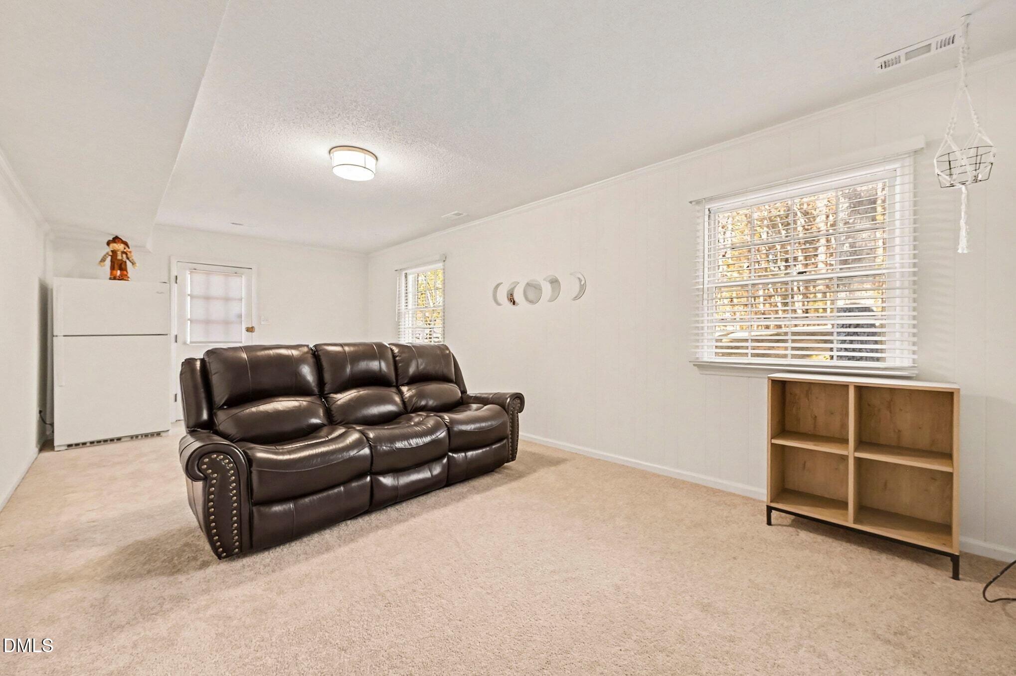 1920 White Plains Road Chapel Hill, NC 27517 - Photo 14 of 31 a living room with furniture and a window